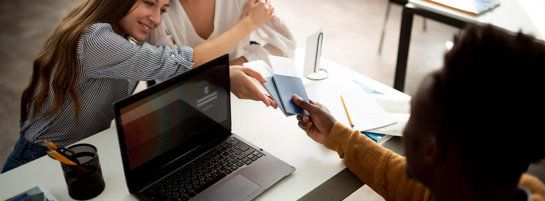 Passport handover during visa consultation